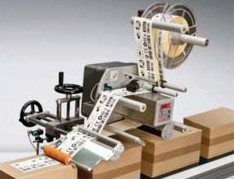 Apllicatore di etichette adesive